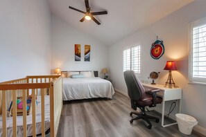 Enjoy a spacious room with a bed and crib, where sweet dreams are made