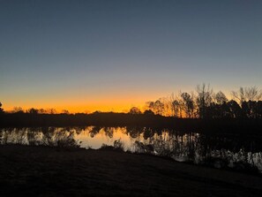 Enjoy beautiful sunrises over the lake on one of two patios.