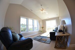 Vaulted ceiling, and amazing views of windswept oaks and ICW from living room