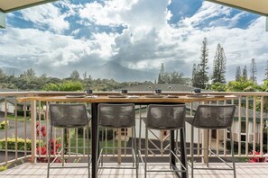 Plenty of space for all 6 guests to enjoy a bird's eye meal on the full length custom tropical hardwood bar