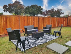 Spacious, fully fenced backyard, accessible from the living room – perfect for pets and relaxing out