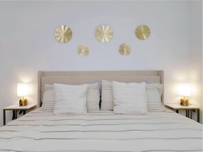 Bright and airy bedroom with a comfortable king-size bed. 