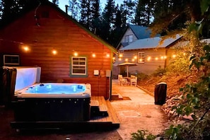 Enjoy the Hot Tub and Outdoor Seating Area with Gas BBQ Grill