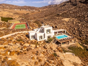 Part of the estate, including the private tennis/basketball court