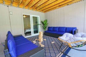 Spacious covered deck with ample seating