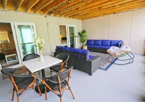 Spacious covered deck with ample seating