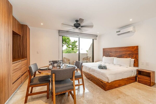 Sleep soundly in this comfortable and serene bedroom, your peaceful sanctuary and dine in comfort and style in this bright, open dining area, designed for easy living.