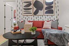 Kick back and relax in this modern, cozy living room—your perfect retreat in the heart of the city!