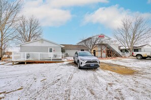 Property Exterior | Enclosed Community Patio | Gas Grill