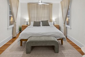 The main bedroom is large with a huge closet and a king bed.
