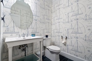 Enjoy a fully equipped bathroom with toiletries, fresh towels, and more.