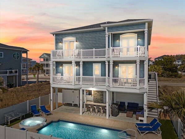 Beautiful, modern beach house with hot tub, heated pool, and tiki bar awaits!