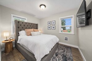 The main bedroom has a queen bed, with comfy memory foam mattress. 