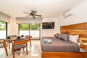Enjoy a restful escape in this spacious bedroom, your personal oasis of calm.