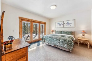 Bedroom 1: King bed, walk-in closet, private outdoor access, en-suite bathroom