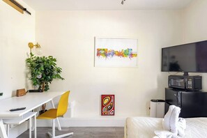 tv, microwave, and mini-fridge for your convience