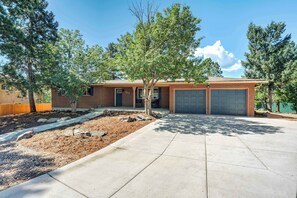 Welcome to Crestgate Den! This spacious retreat offers ample parking, a private setting, and easy access to local attractions and outdoor adventures.