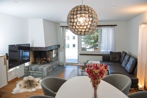 Living area with access to the terrace with private jacuzzi 