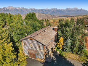 Home from above, driveway, garage pad, entryway, Tetons
