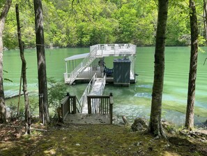 Two level dock provides the perfect spot for lake lounging. Kayaks and canoe available for use