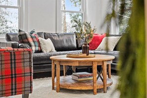 Snuggle up on our buttery-soft sofa in front of the electric fireplace