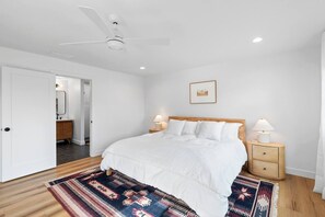 Wake up to mountain views and step straight onto the deck from your private suite. You’ll have premium bedding, a 55" TV, a luxury ensuite bath, and a walk-in closet—it's all yours.