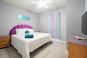 Ariel inspired, this room is the primary suite that any former mermaid would want when living on land.