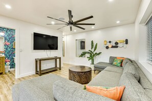 Home 1 | Lower Level | Living Room | Futon | Smart TVs w/ Cable