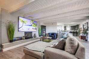 Stream endless shows on the flat screen TV, perfect for watching your top picks