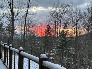 Winter snow created some great sunsets. View from 60’ basement deck.