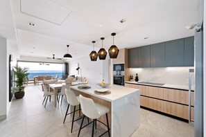 The design maximizes the beauty of the surroundings, with uninterrupted views