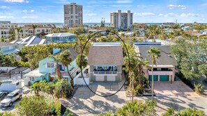 Drone 30 FT Aerial of the front of your beach getaway with the Gulf in the background.