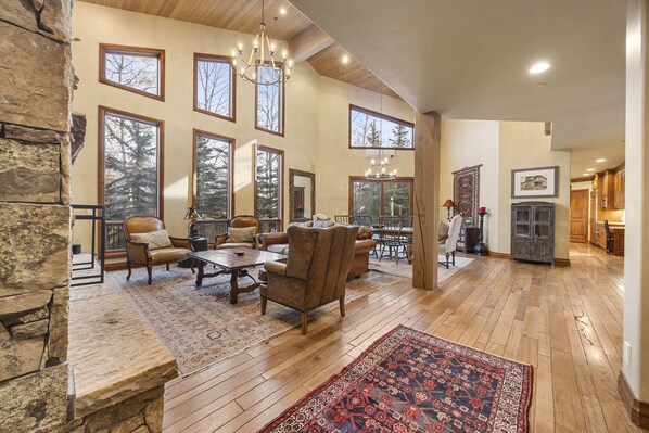 Main floor living room: Smart TV, gas fireplace, radiant heating, mountain views