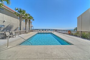 Unwind at the sparkling La Valencia community pool, perfectly positioned with stunning views of the Gulf