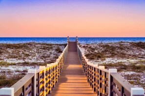 Private boardwalk to the beach from your patio