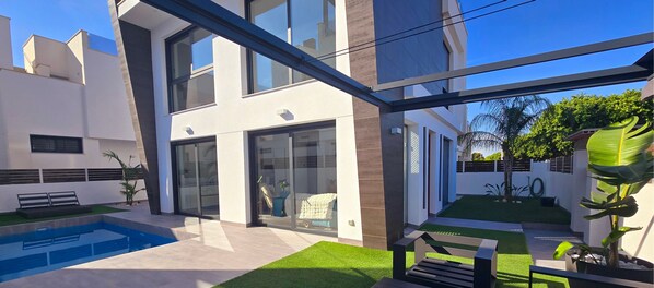 The villa.
