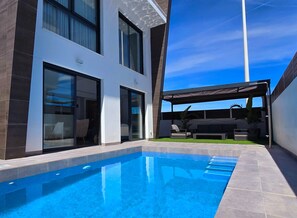 Beautiful view from the sun lounge area looking towards the pool.