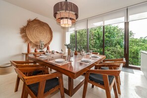 Enjoy meals together in this cozy and well-lit dining space.