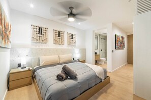 Drift off to sleep in a serene bedroom with a luxurious bed and a calming atmosphere.