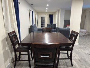 open area with Dining room, living room, bed area and kitchen 