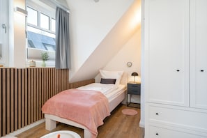 zweites Schlafzimmer mit zwei Einzelbetten