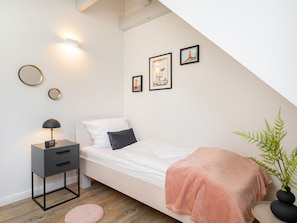 zweites Schlafzimmer mit zwei Einzelbetten