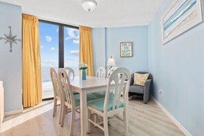 Oceanfront dining room seat 6 however there is a countertop 2 bar seats expands the entertainment options to 8 if needed.  This beautifully decorated beach oasis is ideal for that exciting extended beach escape.  Reading area with lighting for quiet.