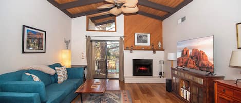Vaulted ceiling, fireplace, 65" smart TV & corner table for remote work