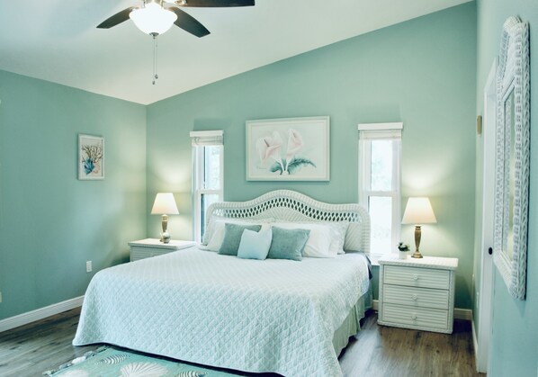 Master bedroom, King bed (blue blanket) 
Sliding door to the pool