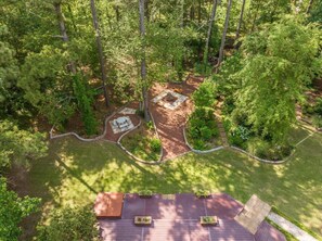 Experience a variety of backyard nooks in this expansive outdoor space!