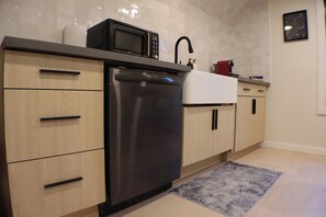 Spacious and functional kitchen, perfect for preparing meals or hosting small gatherings.