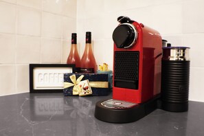 Enjoy a perfect cup from our Nespresso machine, imported from Europe for your morning routine.