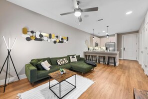 Living room equipped with Smart TV & Comfy Couch