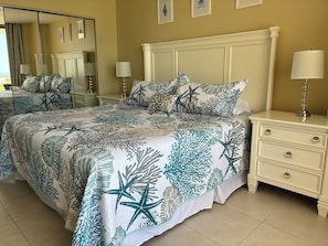 Master bedroom with a king size bed and balcony with a Gulf/beach view.